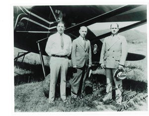 Governor Herman Kump, 1932-1937, standing proudly next to his pilot and a member of his executive protection unit while under the wing of the state owned Stinson airplane